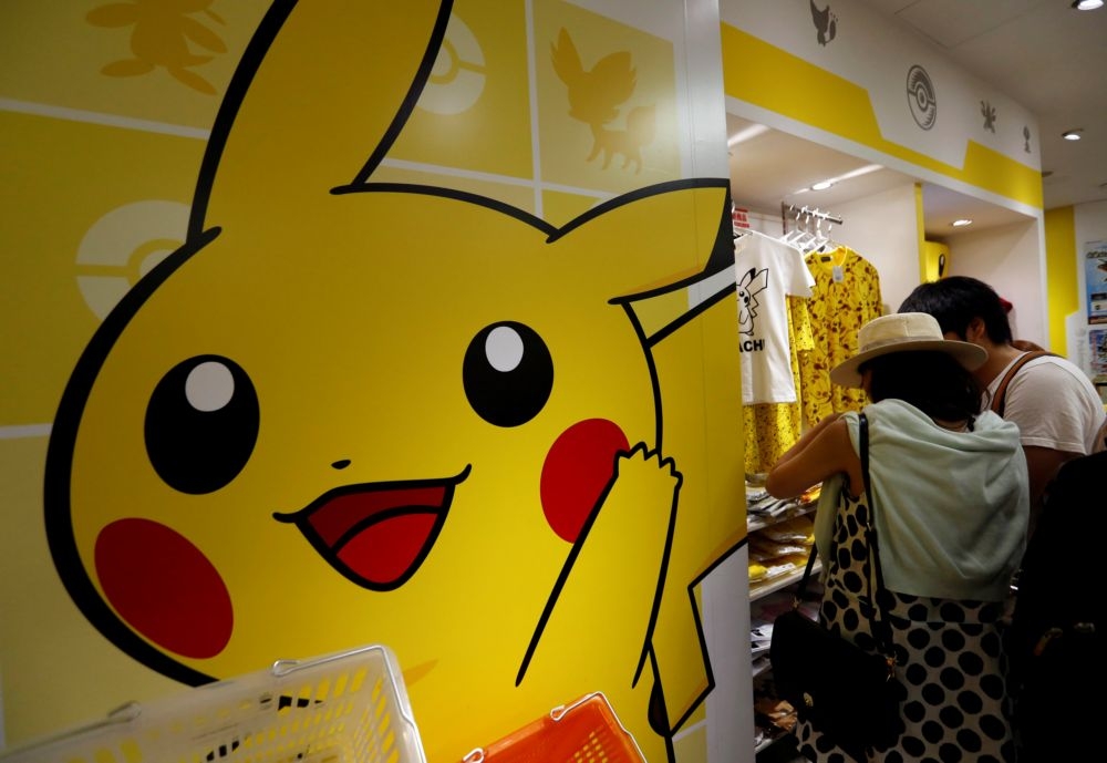 日本任天堂出品的Pokémon GO遊戲風靡全球。（湯森路透）