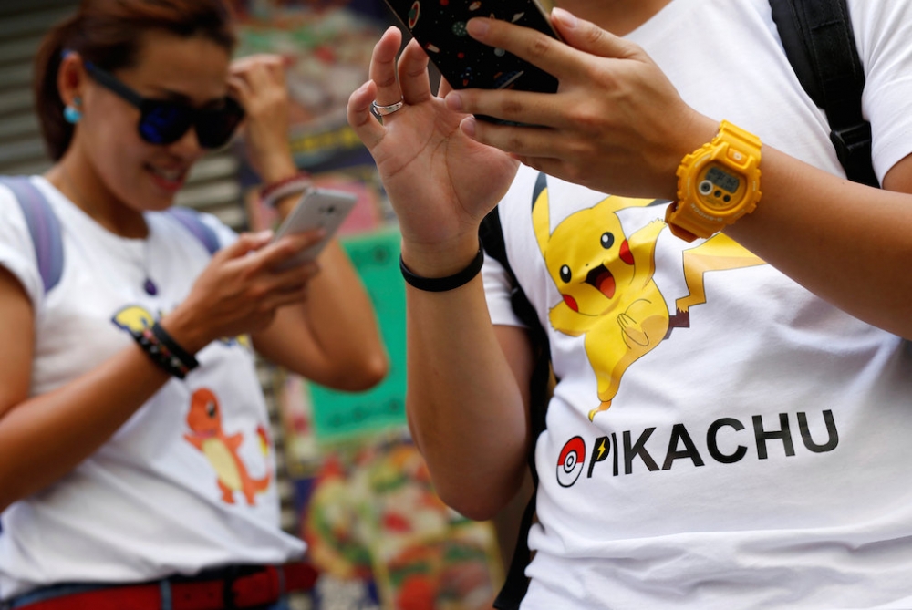 Pokémon GO現象正挑戰著一代人的認知能力。（路透社）
