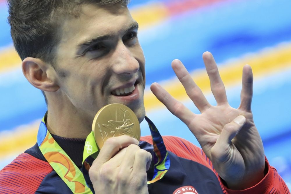 12日，美國泳將菲爾普斯奪下個人第22面金牌。（湯森路透）