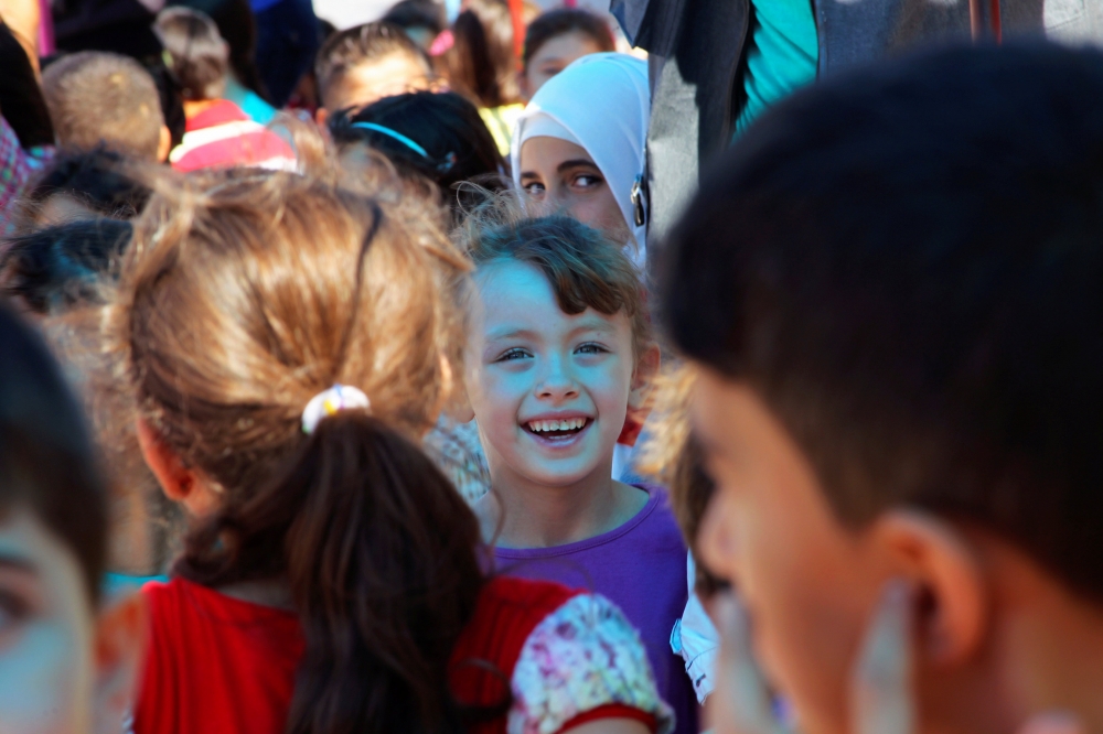 古爾邦節第三天，敘利亞孩童在反政府軍佔據的地區遊玩。（湯森路透）