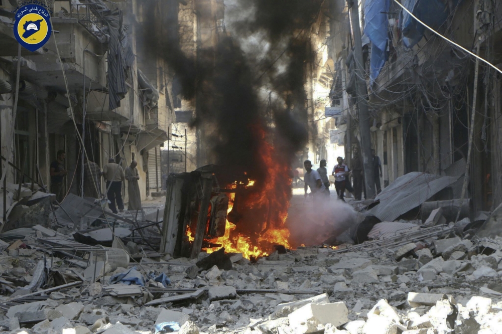 敘利亞第一大城阿勒坡遭空襲。（美聯社）