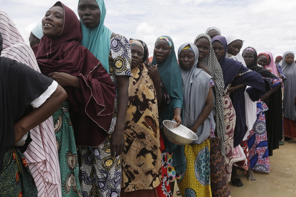 奈國婦女為躲避博科哈蘭（Boko Haram）逃至邁杜古里（Maiduguri）避難營。（美聯社）