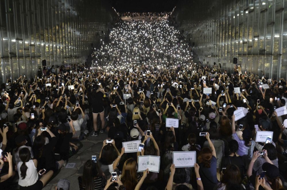 2016年8月10日，南韓梨花大學爆發第一次學生抗議。（美聯社）