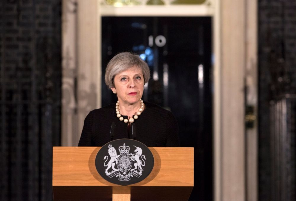 英國首相梅伊22日晚間發表談話。（湯森路透）