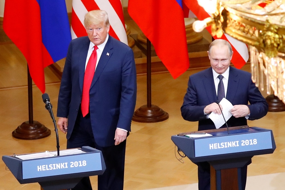 美國總統川普，與俄羅斯總統普京16日在芬蘭舉行首次正式會談。 （湯森路透）