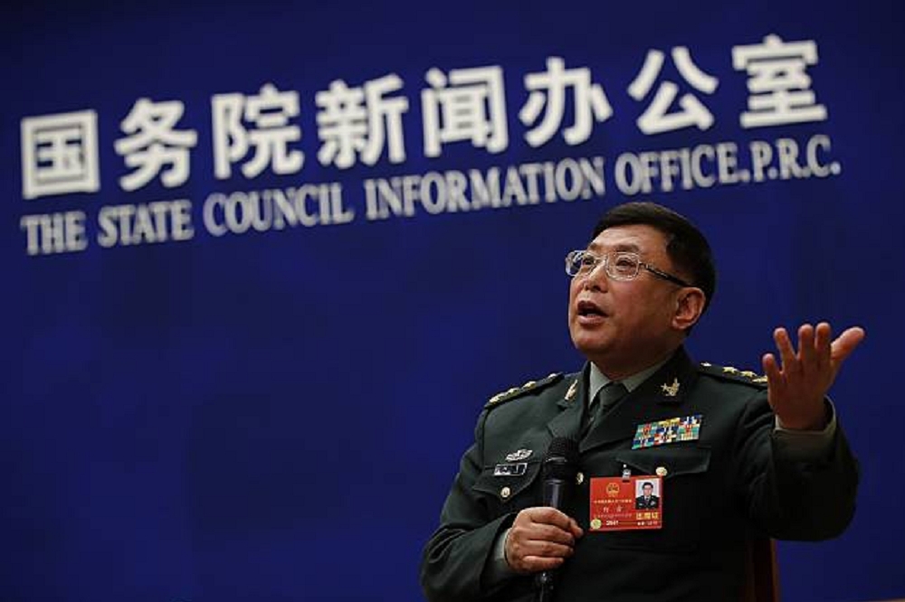 身為中國人大代表的解放軍中將何雷，8日說明2018年度國防預算，並提及部署於南海的武器，不針對任一國家，但針對侵略者。（美聯社）