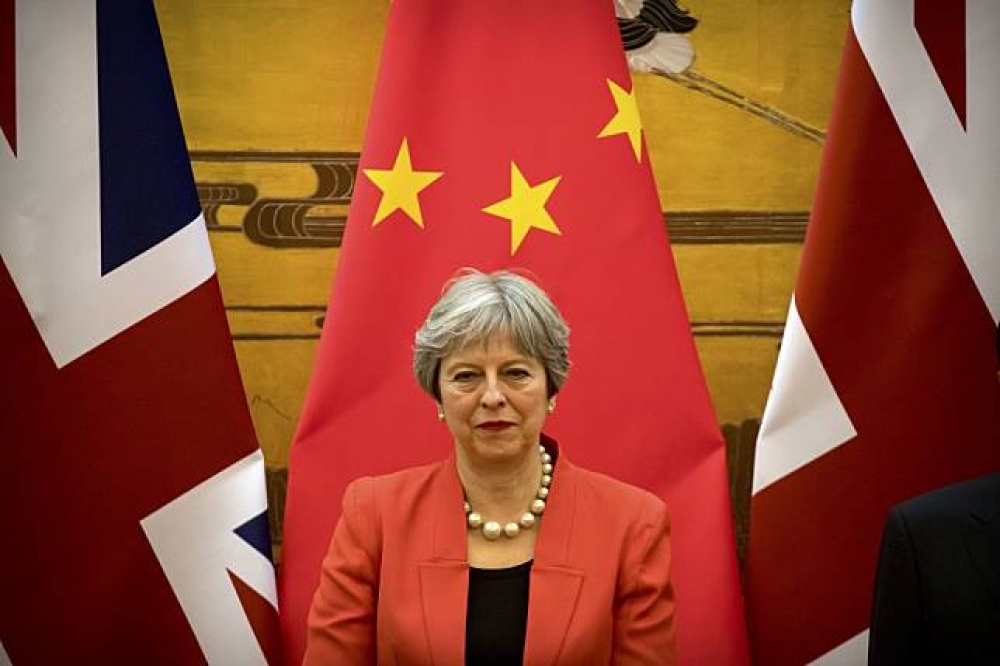 英國首相梅伊於31日展開為期3日的訪中行程。（美聯社）