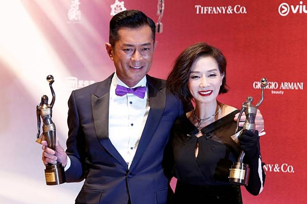 古天樂（左）與毛舜筠拿下分別第37屆香港電影金像獎的最佳男主角和最佳女主角（湯森路透）