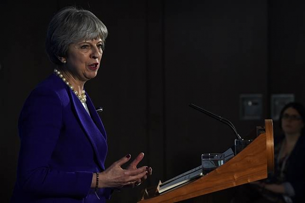 英國首相梅伊6日於曼徹斯特發表演說。（湯森路透）