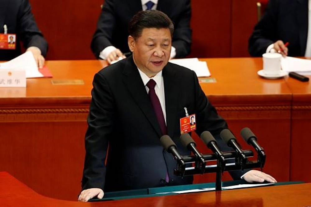 中國第十三屆兩會人大第一次會議20日閉幕，中國國家主席習近平發表講話。（湯森路透）