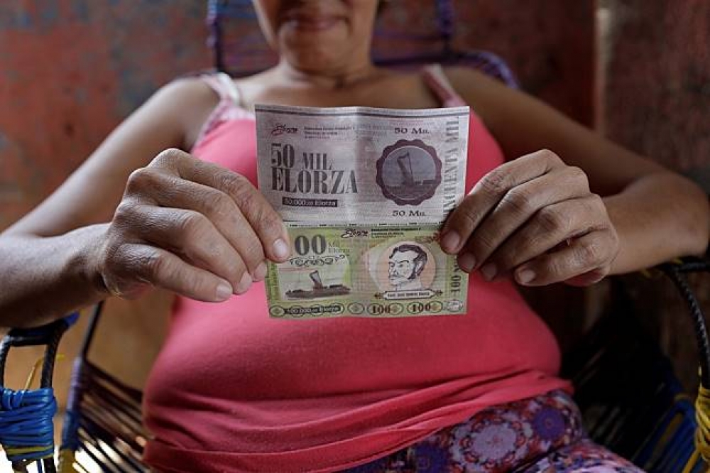 埃洛薩新發行的自有貨幣印有當地獨立運動領袖荷西・安德烈斯・埃洛薩之頭像。（湯森路透）