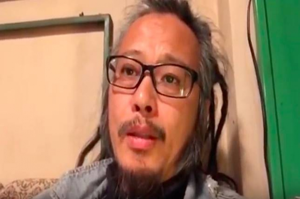 48歲的華湧被通緝期間，錄製多段影片呼籲「關注中國」，並要求獨裁政府釋放政治犯。（翻攝自youtube）