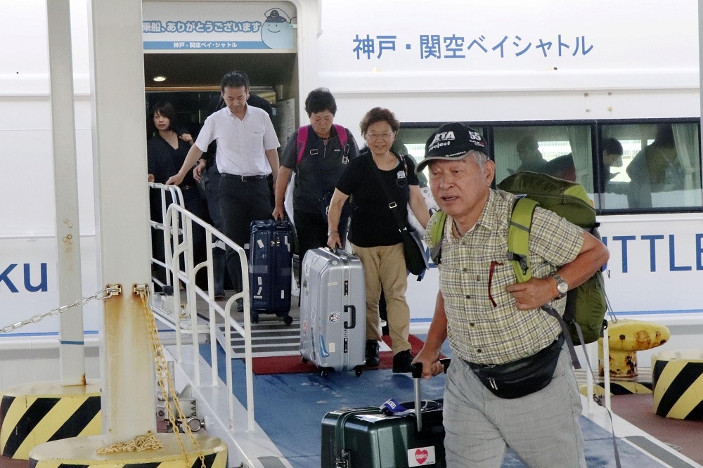 日本關西機場21日全面恢復營運，所有客機航班恢復正常。（湯森路透）