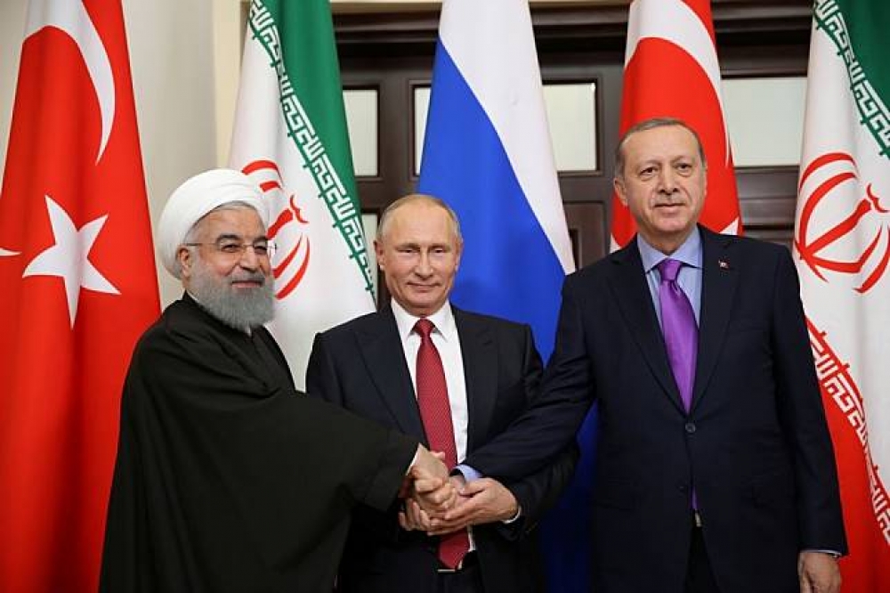 由左至右分別為，伊朗總統羅哈尼、俄羅斯總統普京、土耳其總統艾爾多安。（湯森路透）