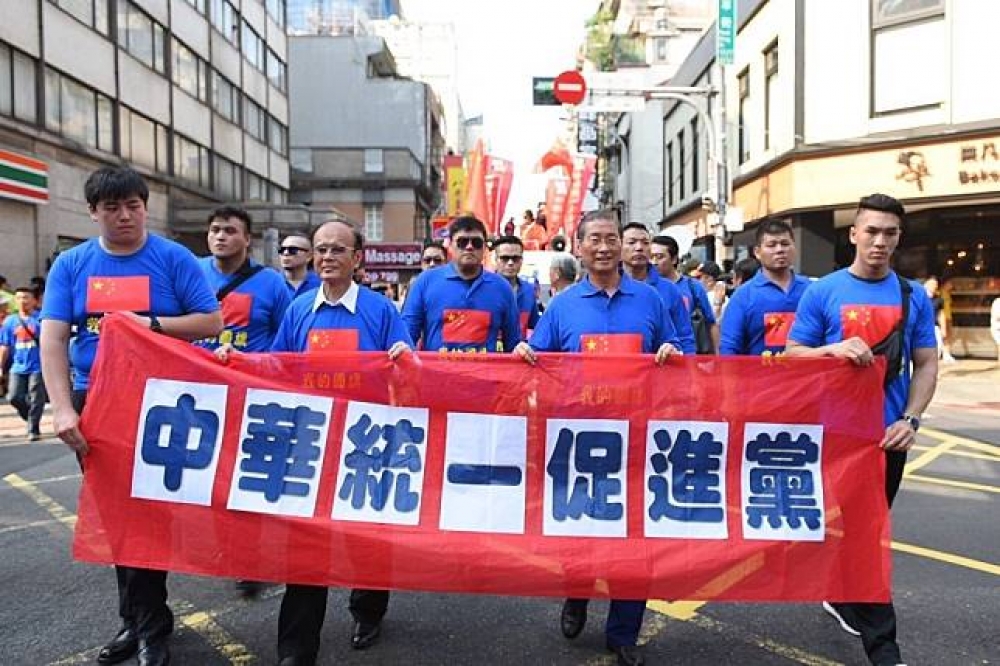 由白狼張安樂帶領的中華統一促進黨於10月1日舉辦「慶祝光輝十月」遊行。（攝影：李昆翰）