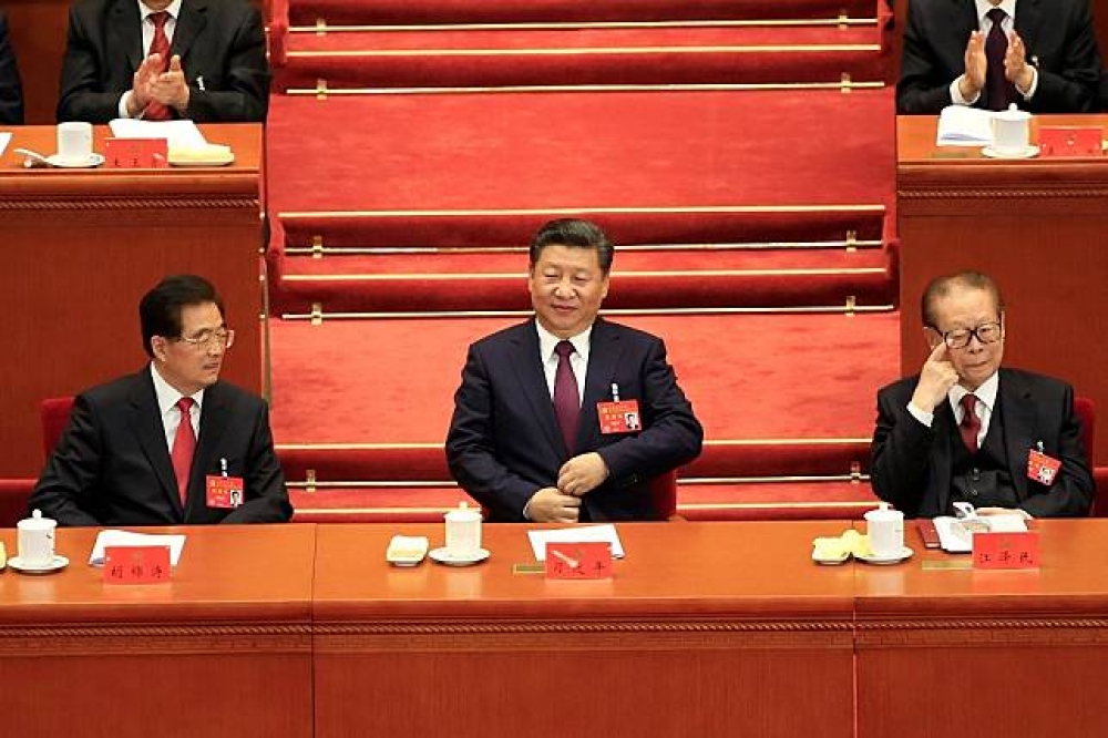 中國領導人習近平18日出席「十九大」開幕。（湯森路透）