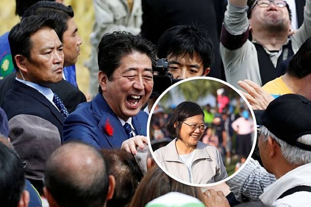蔡英文總統透過邱義，向贏得眾議院選舉的日本首相安倍晉三，表達祝賀之意。（合成畫面／陳品佑攝、湯森路透）