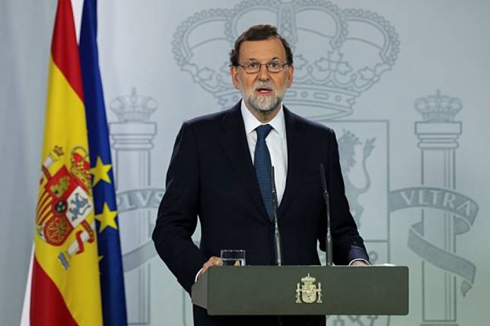 西班牙總理拉侯伊（Mariano Rajoy） 19日表示，將引援憲法地155條，收回加泰隆尼亞自治權。（湯森路透）