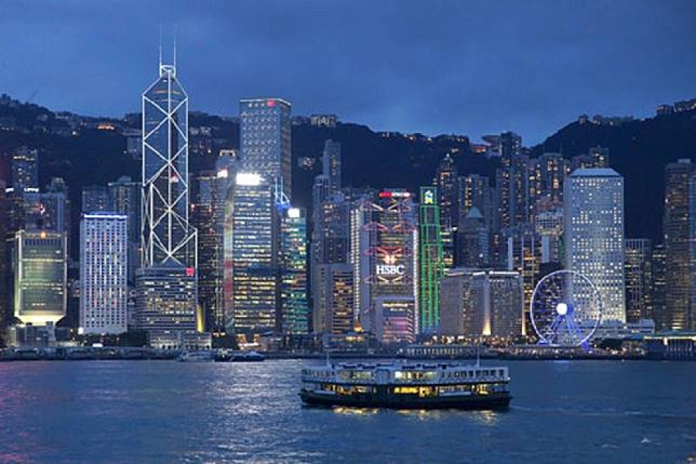 中國連假超級黃金周登場，訪港旅客大增，香港酒店訂房率高居不下。（美聯社）
