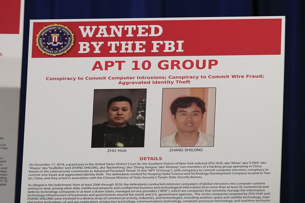 中國2名駭客朱華和張士龍，因竊取美國政府機關智慧財產，遭到美司法部起訴。（美聯社）