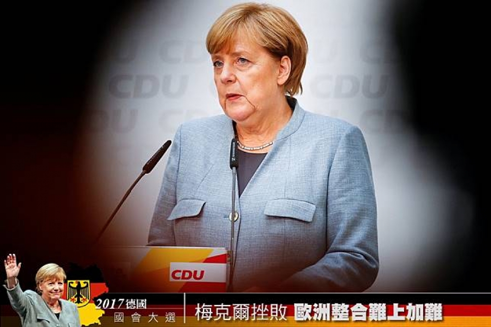 德國總理梅克爾25日召開基督教民主黨記者會。（照片：湯森路透，後製：潘世惟）