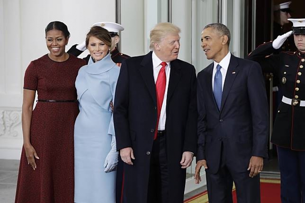 今年1月美國總統正式交接，右至左分別是前總統歐巴馬、現任總統川普、第一夫人梅蘭妮亞（Melania Trump）、前第一夫人蜜雪兒（Michelle Obama）。（美聯社）