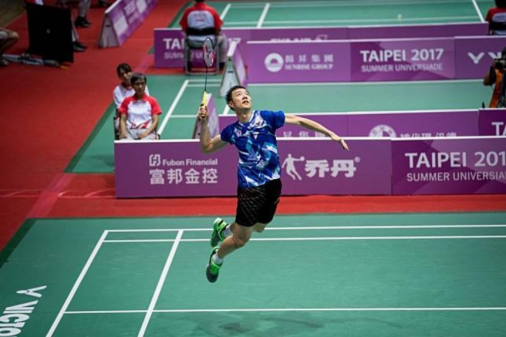 台灣男單「羽球王子」王子維在世大運羽球男單項目的四強戰，面對日本選手五十嵐優，終場以23：21奪下金牌戰，創下紀錄成為台灣男單第一人（攝影：李昆翰）