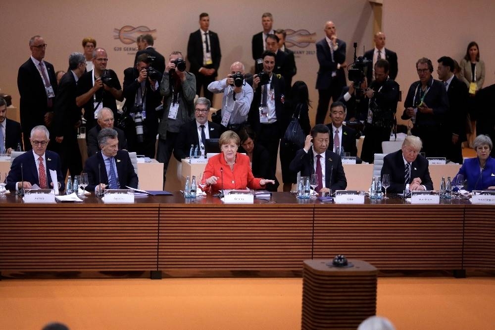 G20峰會聯合聲明特別寫明美國退出《巴黎協議》。（湯森路透）