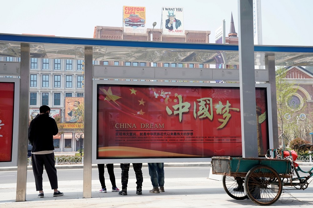中國《人民日報》指出中國不怕打貿易戰。（湯森路透）