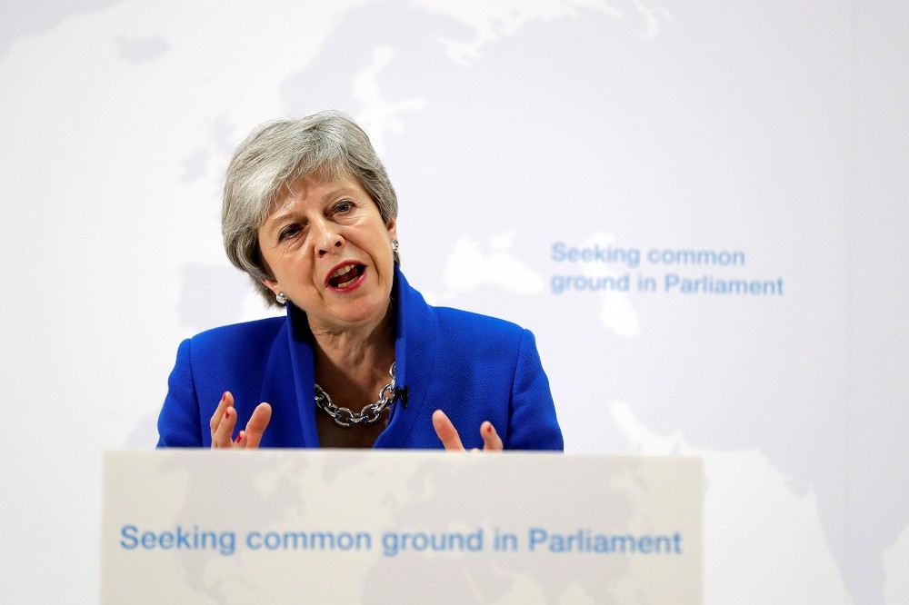 英國首相梅伊敦促國會議員通過新的脫歐協議。（湯森路透）