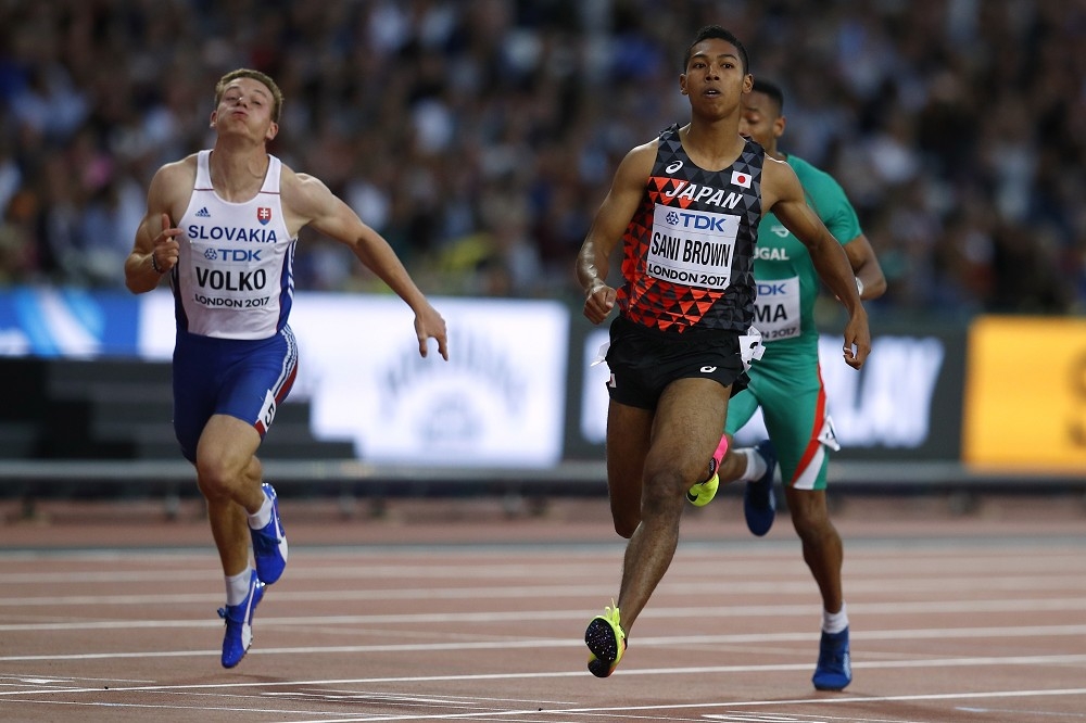 日本籍選手薩尼布朗（身著黑衣）2017年參加在英國舉辦的田徑世錦賽男子100公尺短跑。（湯森路透）