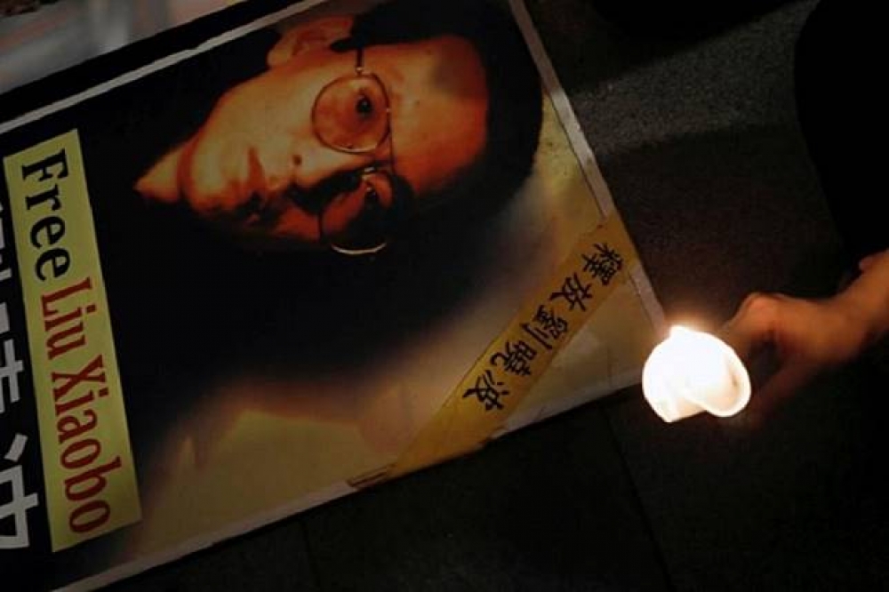 諾貝爾和平獎得主劉曉波13日病逝，中國政府不僅要求家屬不得與外界聯絡，甚至在各社群平台裡，強制禁止民眾使用與劉曉波有關文字和表情，比如「蠟燭」。（湯森路透）
