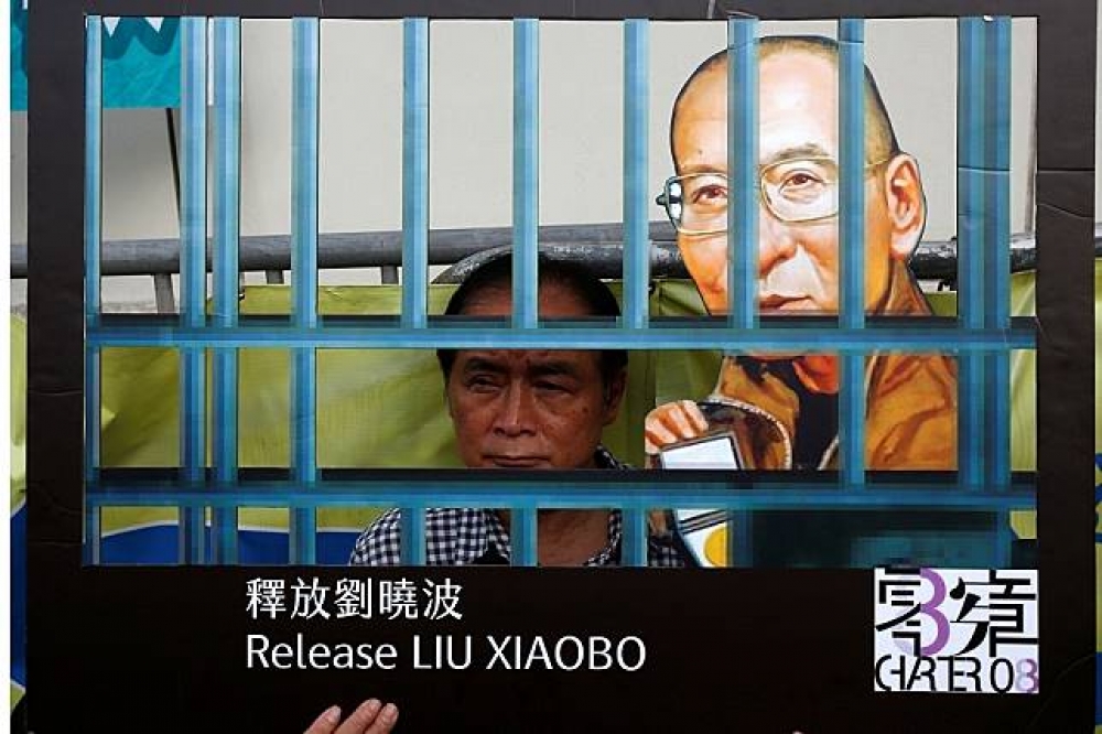 公布《零八憲章》是劉曉波入獄的直接原因。（湯森路透）