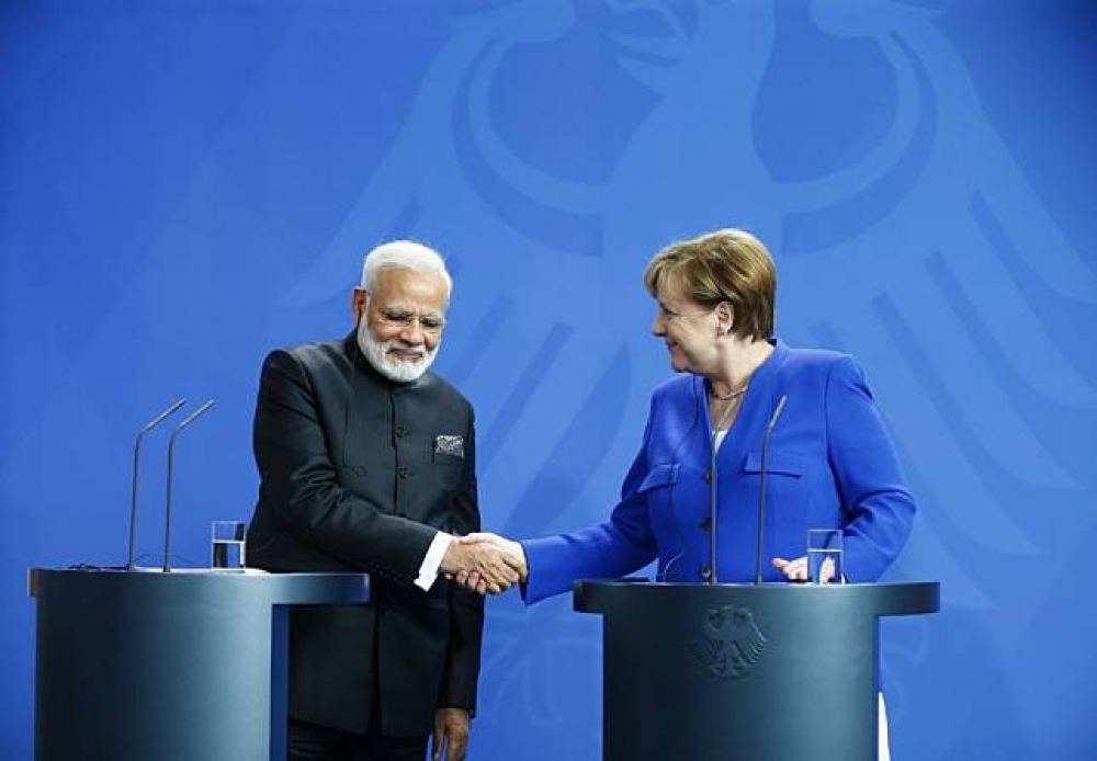 印度總理莫迪（左）、德國總理梅克爾（右）。（湯森路透）