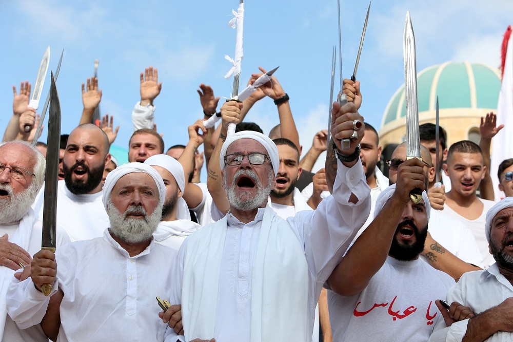黎巴嫩的什葉派男子上街參與宗教遊行。（湯森路透）