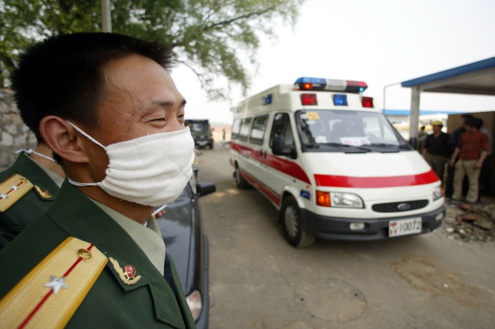 中國武漢再添一起因新型冠狀病毒的死亡案例。（湯森路透）