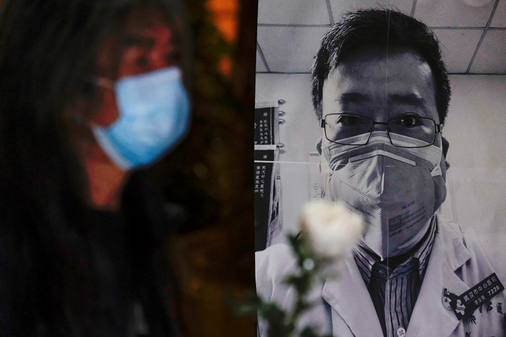 李文亮醫師之死引發中國網友要求言論自由。（湯森路透）