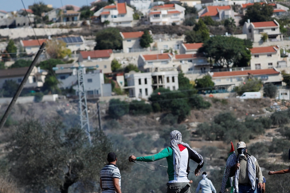 巴勒斯坦人不滿以色列在西岸地區建立屯墾區。（湯森路透）