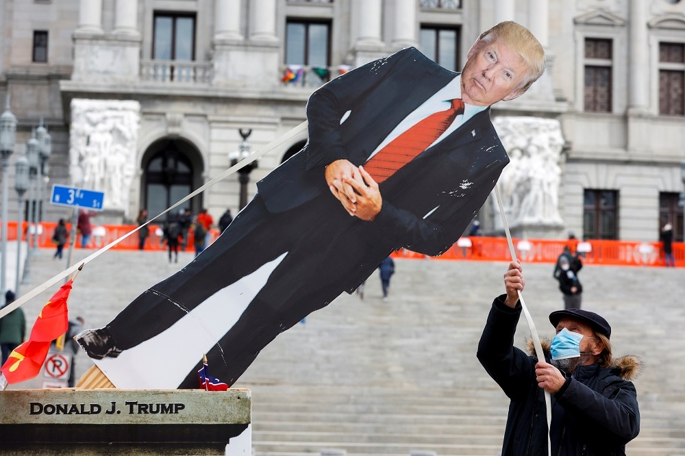 美國總統川普的人形立牌。（湯森路透）