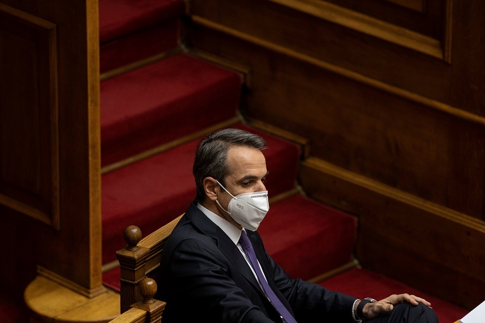 1 月 15 日希臘總理米佐塔基斯出席政府防疫會議。（湯森路透）