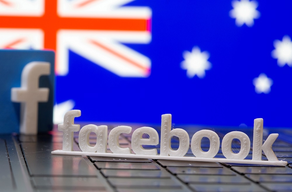 臉書標誌和澳洲國旗。（湯森路透）