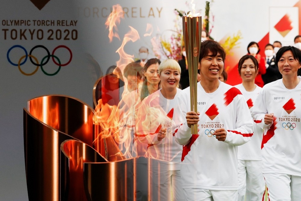 奧運聖火傳遞自福島起跑，前日本女足選手岩清水梓擔任首位火炬手。（湯森路透）