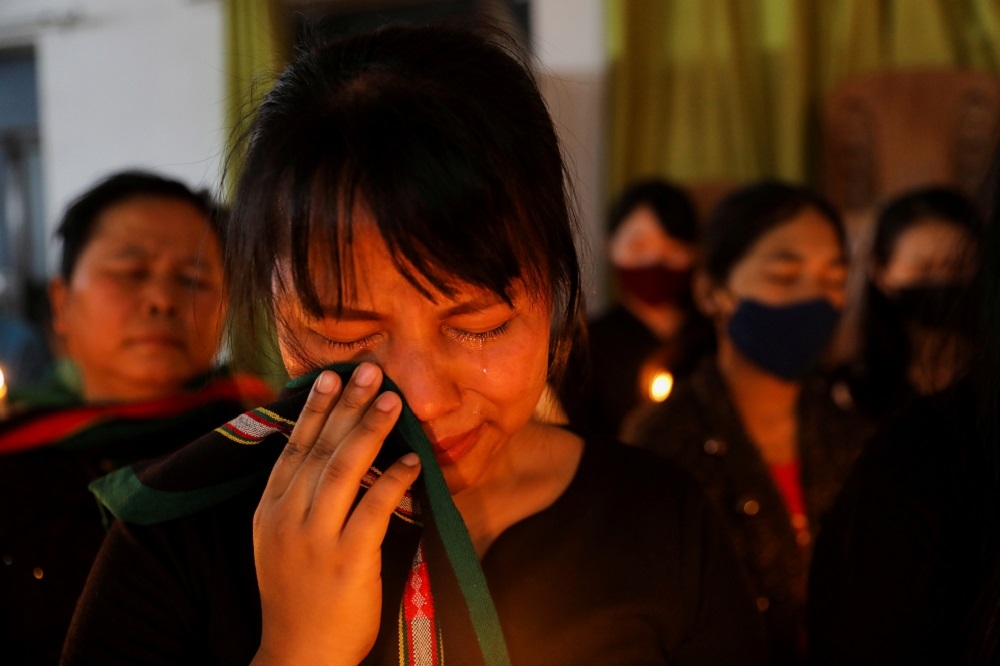 逃亡至印度的緬甸欽邦難民，於24日舉行向亡者悼念儀式。（湯森路透）