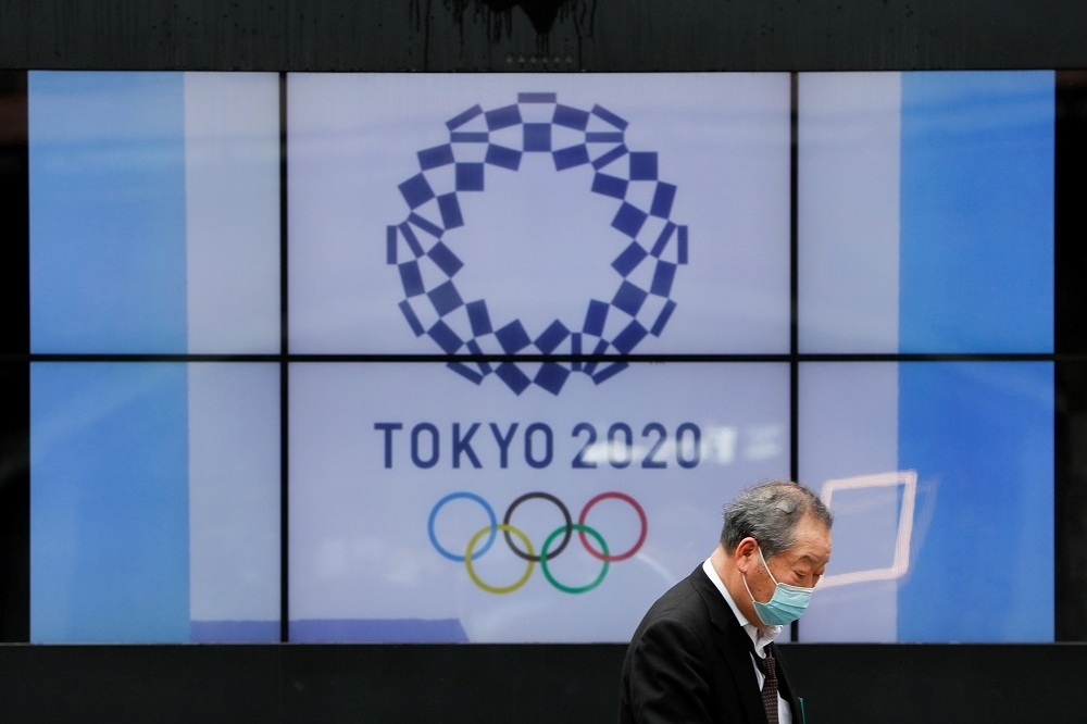 日本政府堅持舉辦東京奧運，但國內疫情趨勢、卻讓專家與民眾非常憂心。（湯森路透）