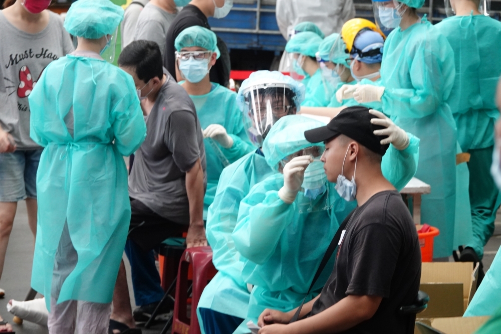 中央流行疫情指揮中心22日公布國內新增78例本土病例。（王侑聖攝）