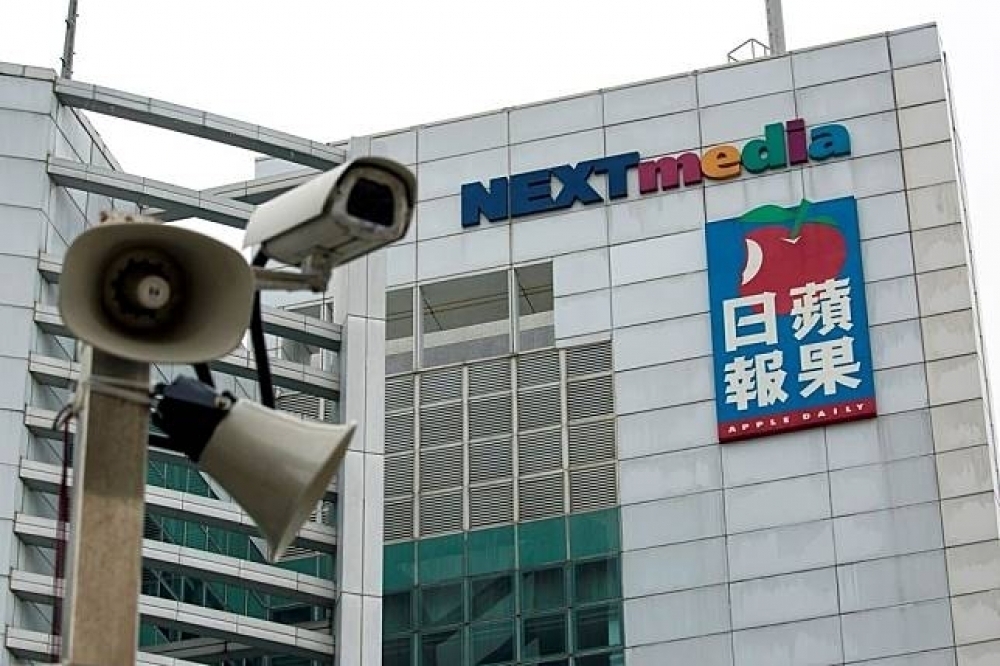 香港壹傳媒公司29日晚間發布公告表示，將出售《蘋果日報》網路版全部股權。（湯森路透）