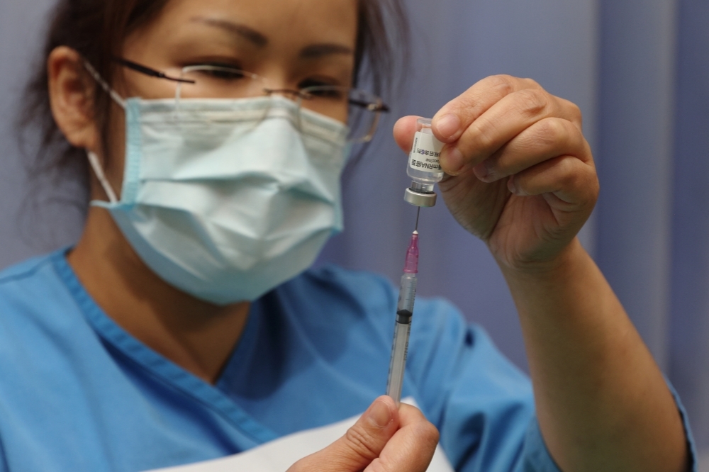 新北市20日再新增2例疫苗不良反應，個案分別接種BNT和AZ疫苗後身亡。（資料照片／陳愷巨攝）