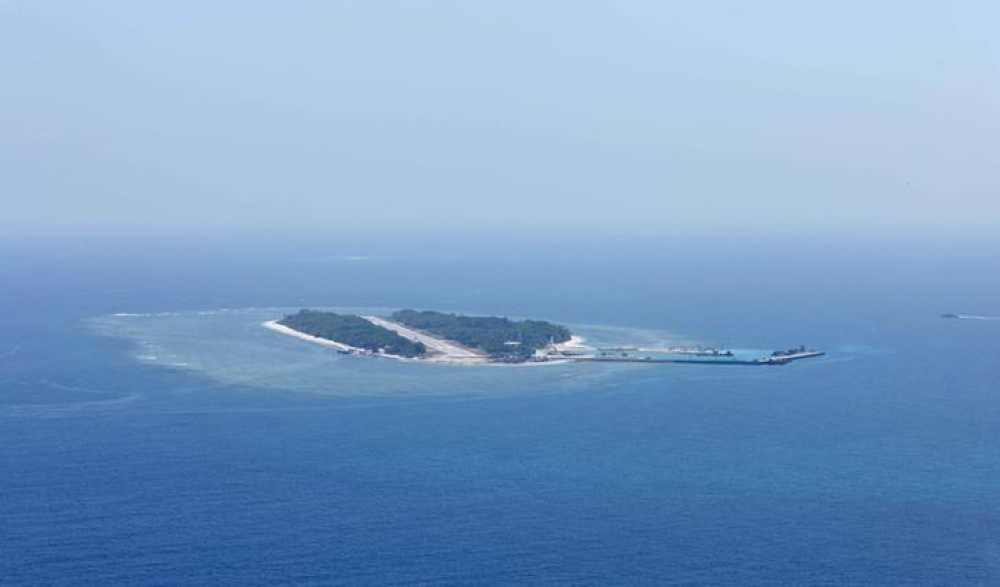 我位在南沙的太平島，在海牙仲裁法院被認定為礁岩。圖為太平島。（湯森路透）