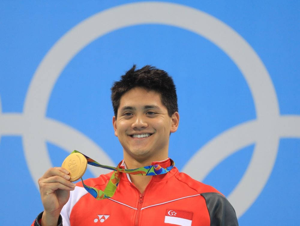 新加坡泳將斯庫林13日勇奪奧運男子100公尺蝶式冠軍。（湯森路透）