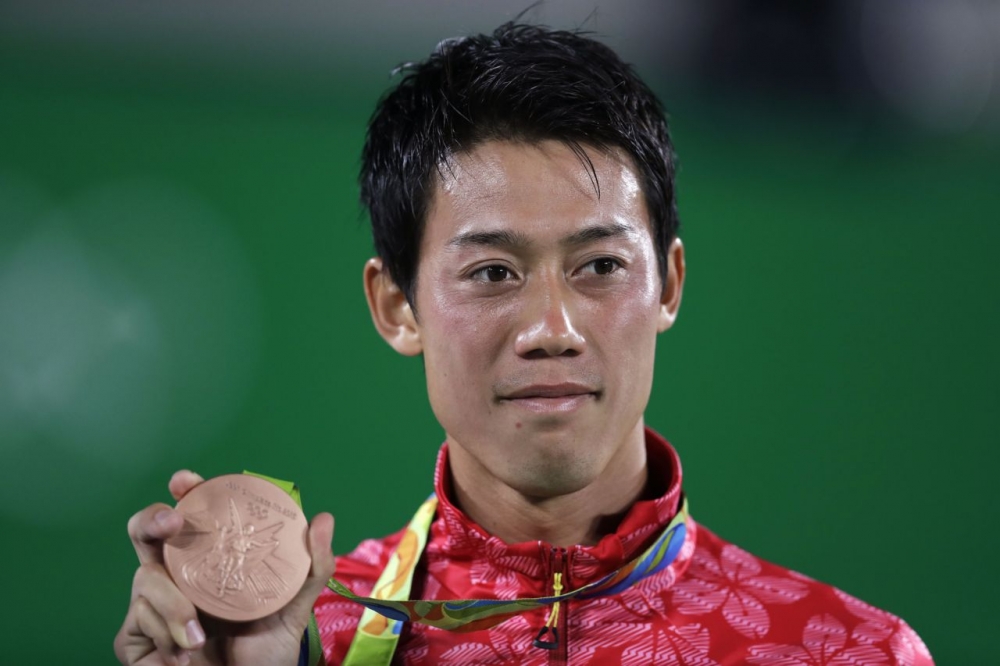 里約奧運網球男子單打銅牌戰，日本好手錦織圭擊敗納達爾，奪得獎牌。（美聯社）